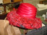 One of the fine hats and vintage clothing items