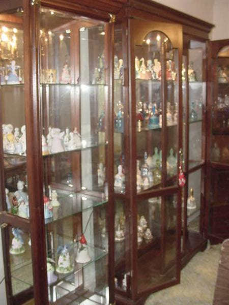 Two of the several cabinets full of this wonderful bell collection.