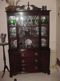 One of several china cabinets, full of vintage glassware and porcelains