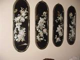 Lacquered wall panels with mother of pearl overlay artwork