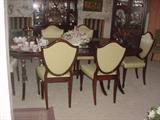 Another view of dining room table and chairs