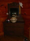 Poor picture, but a very nice dresser with back mirror, and wash pitcher and bowl