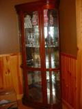 Wonderful glass and wooden curio cabinet, inside are nice glassware and figurines