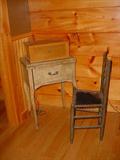 Sewing cabinet with cane bottom side chair