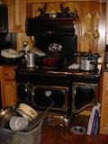 Much pots and pans...just had to include this pic of the wonderful stove, but it is not included in the sale as goes with the house sale.