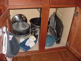 nearly new pots, pans, and cookware.