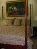 Beautiful 4 poster bedroom suite and all the custom bedding.