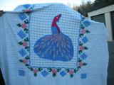 Large chenille peacock spread