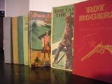 Several old books, including early childrens books
