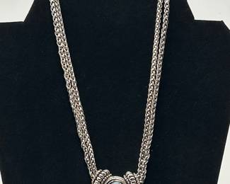 Silver tone multi strand necklace with cat's eye stone pendant, $12