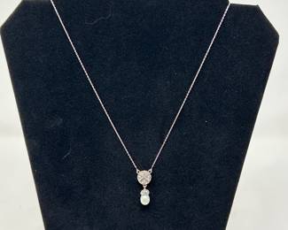 Silver tone necklace w/round crystal-paved station w/white pearl drop, $12