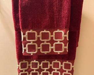 One set of Burgundy towels, $15