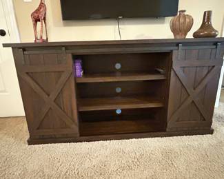 Media console with sliding doors, 63.5"W x 16"D x 32"H, $225