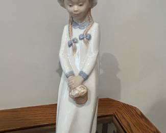 NAO by Lladro, Girl with Basket Sweets, 9.75" H, $15