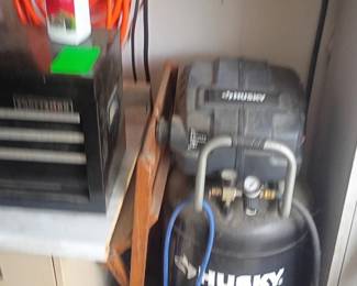 blurry photo. nice Husky air compressor