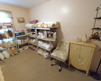 yellow cabinet, décor pillows, quilts, linens