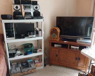 Panasonic stereo, HP computer, Kodak easy share printer, Nikon Coolpix, Kodak easy share camera, Samsung 3D blu ray, Sanyo DVD player, LG 43” tv