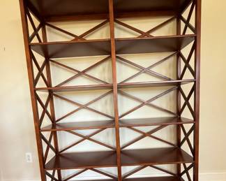 Ballard Designs Tuscan Collection tall wood bookcase in Antique Cherry/Auburn finish. Traditional architectural styling with paneled construction. Dimensions: 26 1/2"W x 15"D x 81 3/4 H