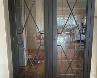 Ethan Allen Birkhouse Display Cabinet Dimensions: 2 are available. Dimensions: 55.75" W x 18"D x 83"H Recessed interior lights with dimmer | Shelving: 8 adjustable glass shelves 4 on each side | 2 full-height decorative glass doors