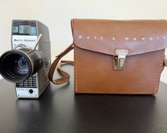 Vintage Bell & Howell Model 314 Zoom Electric Eye 8mm Movie Camera, Case and Manual Comes with original brown Bell & Howard carrying case and Model 314 Instruction Manual