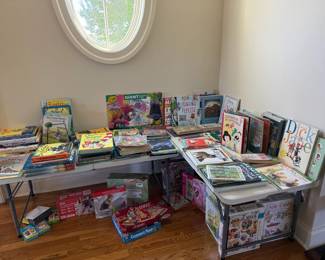 Children's corner of books, games, and puzzles. Wonderful assortment - Madeline, Dick & Jane, Seasonal books - Halloween, Valentine's Day, Berenstain Bears, Dr. Seuss, Books by Roald Dahl, Peter Pan, Story of Babar and more!