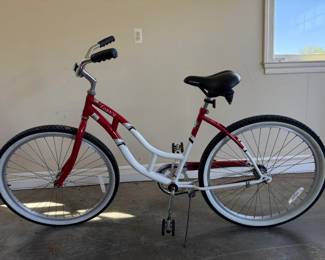 Two - Schwin Legacy Women's 26# Cruiser Bicycles - Attractive red and white cruiser featuring classic styling, comfortable Schwin saddle and 26 inch wheels.