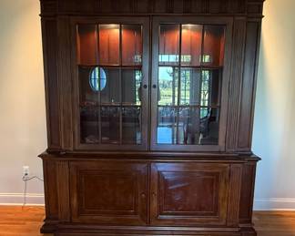 Ethan Allen Kentmere China Cabinet 2 piece beautiful architectural china cabinet with recessed interior lights. Needs to be disassembled - top and bottom - to move.