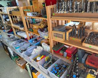 tons of drill bits, router bits, and other woodworking hardware
