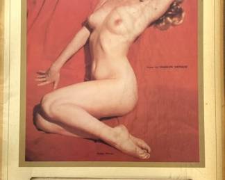 Authentic 1955 Marilyn Monroe "Golden Dreams" Executive Desk Calendar / Planner  An original 1955 multi-page desk calendar and planner featuring Marilyn Monroe's 1949 "Red Velvet" photograph by Tom Kelley. Manufactured by the John Baumgarth Co., this version is mounted to its original rigid cardboard backing. The main lithograph sheet features a textured linen finish and includes the printed metallic gold facsimile signature in the upper left corner.  The piece retains its full 12-month calendar pad (January through December 1955) layered over an unwritten "Important Telephone Numbers" ledger sheet. The reverse side of the structural cardboard backing shows natural ink and adhesive ghosting consistent with mid-century materials and aging. 
