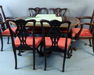 Kittinger Dining Table On Castors, 30" x 60" x 42", 18" Leafs, Qty 2, And V.O. & Co. Carved Dining Chairs With Ball And Claw Feet, Upholstered Seats, And Serpent Head Accents On The Captains Chairs 