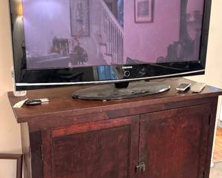 Mahogany Storage Cabinet with Paneled Doors / Samsung TV