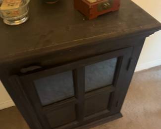 Dark Wood Two-Door Accent Cabinet with Decorative Glass Panels
