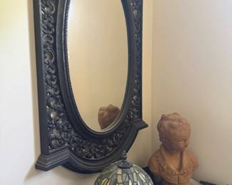 Ornate Carved Oval Wall Mirror with Tiffany-Style Lamp & Decorative Bust