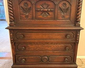 Jacobean Oak Tallboy/Court Cabinet featuring Carved Wooden Panel Accents and Barley-Twist Spindles
