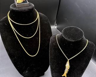 Gold-Toned Lot Featuring Clip-on Earrings, Articulated Fish Necklace And A 27” Chain