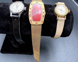 Vintage Ladies Watches Featuring A Rare Timex Electric Red Dial Watch