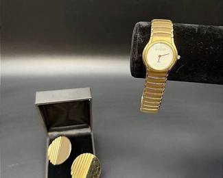 Gold-Toned Lot Featuring A Skagen Denmark Watch And Napier Clip-on Earrings