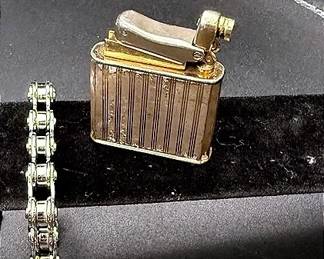 Bicycle Chain Bracelet And Vintage Lighter