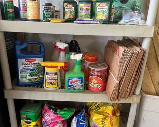 Assorted Garden Chemicals and Storage Shelving