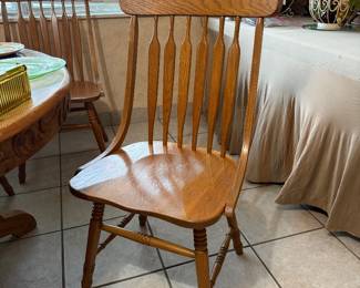 One chair of 6. Oak.