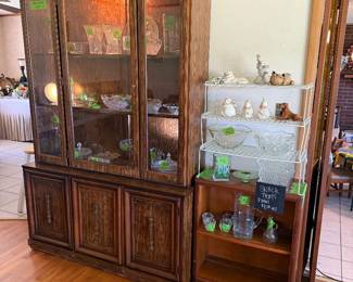 Glassware and small bookcase.