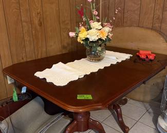 Dining table plus leaves. 