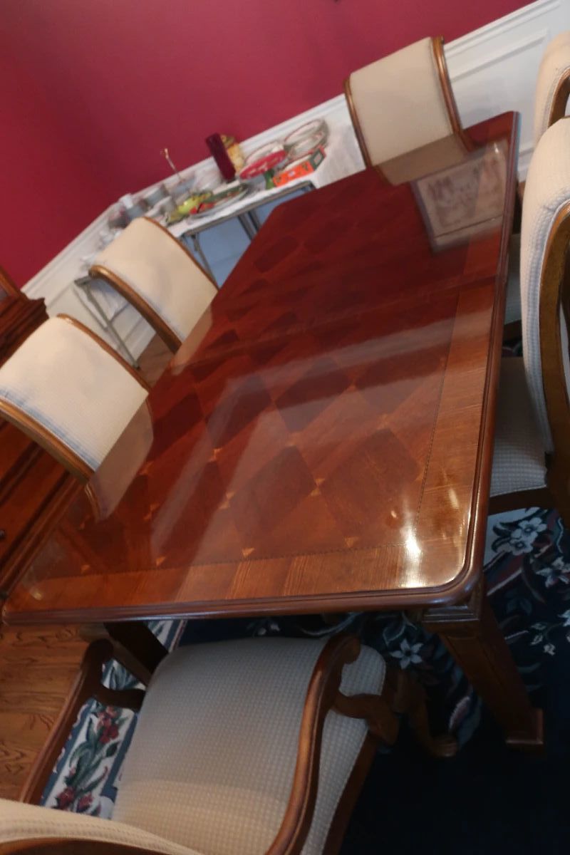 Dining room table and 6 chairs. There are 2 leaves and pads. 72" x 42"