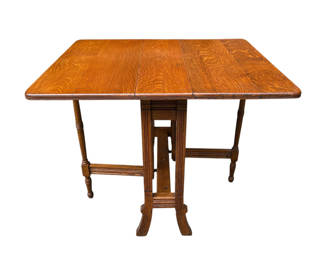 Lot 35: Antique Victorian Tiger Oak Drop Leaf Table 
