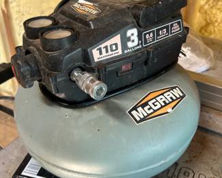 McGraw 3-Gallon Pancake Air Compressor — 110 PSI This McGraw 3-gallon pancake air compressor features a 110 PSI maximum, 1/3 HP running motor, 0.6 SCFM at 90 PSI, and an oil-free pump for low maintenance. The "McGRAW" branding and specs are clearly printed on the motor shroud. Pancake air compressors in the 3-gallon range are a go-to for brad nailing, stapling, tire inflation, and light airbrushing, and this compact unit stores easily in a workshop or truck bed. Shows moderate use with surface dust. Working condition not confirmed — sold as found.