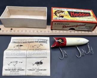 Antique wooden Heddon fishing lures.