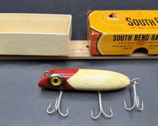 Antique South Bend wooden fishing lures.