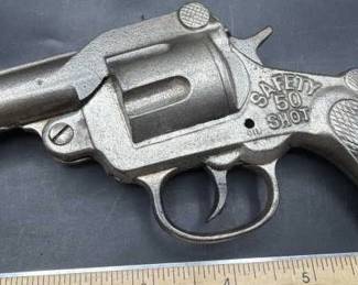 Toy gun. Metal.