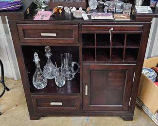 Bar cart and selection of decanters