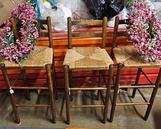 Set of cute, ladder-backed counter stools with rush seats